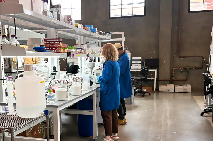 Co-founder & Chief Operating Officer at Birch Biosciences Emily Duncan and Scientist Rick Sayler use enzymes to break down plastic into new, recycled plastic.